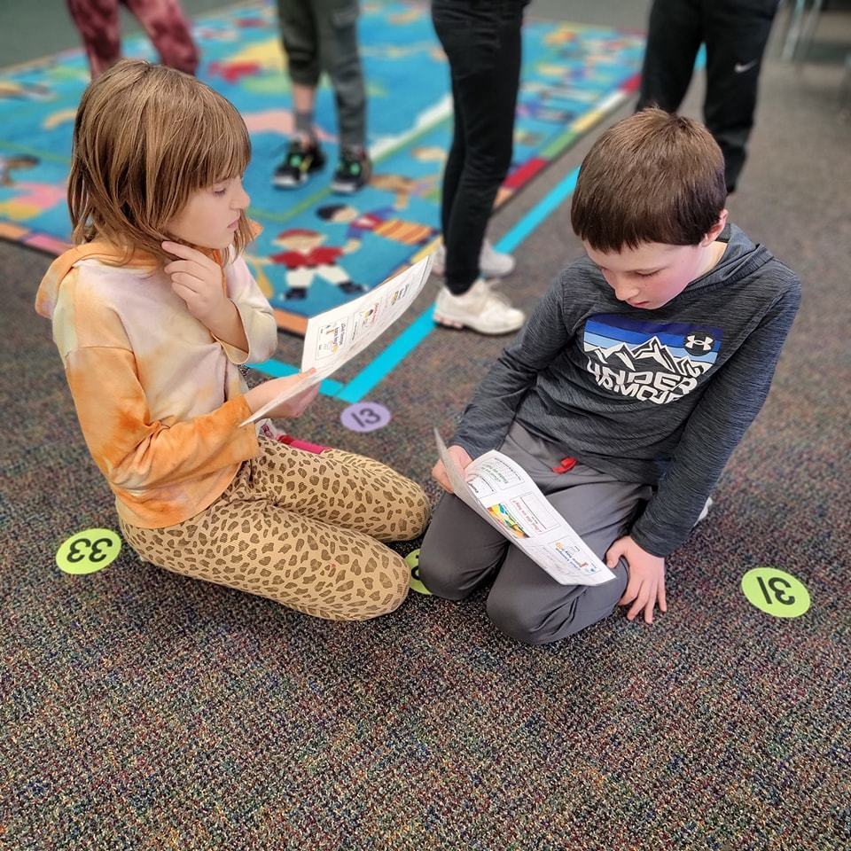 students asking each other questions