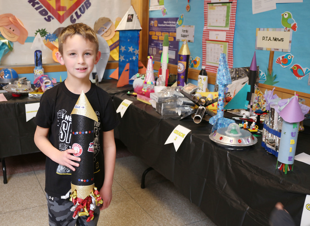 Student with rocket.