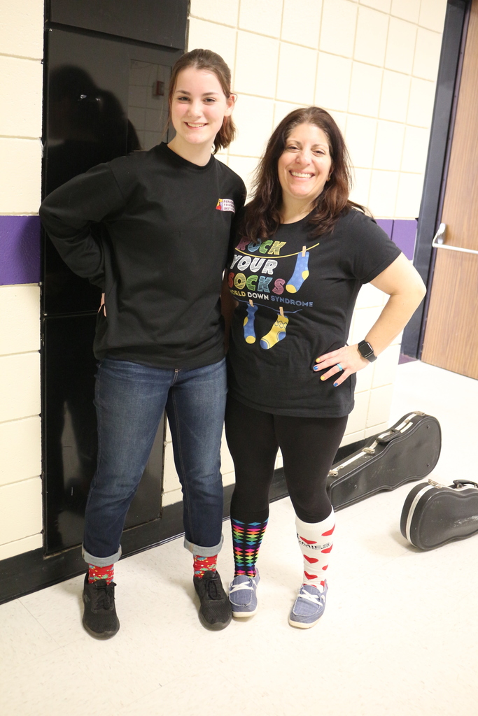 student and counselor wear crazy socks.