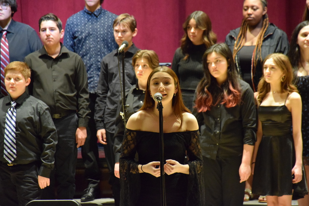 LVHS chamber singers and Hofstra chamber choir share the stage for a collaborative concert.