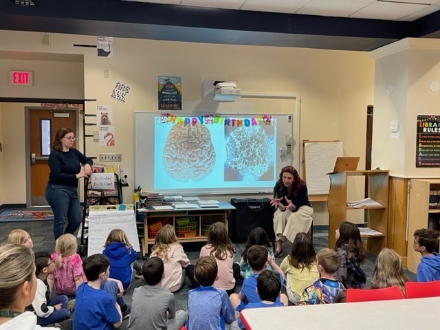 Wilson students getting an introduction to the neurodiversity station activities  with district behaviorists