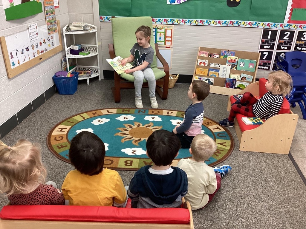 First-graders read to toddlers