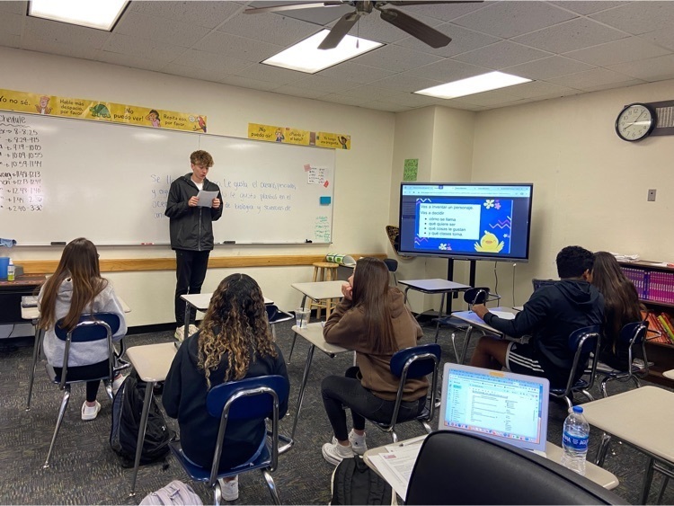 Austin reading clues about a mystery career. 