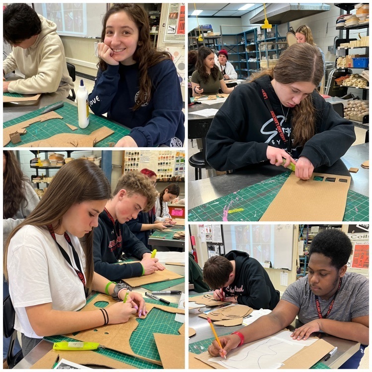 Students working hard on their abstract Picasso sculptures.