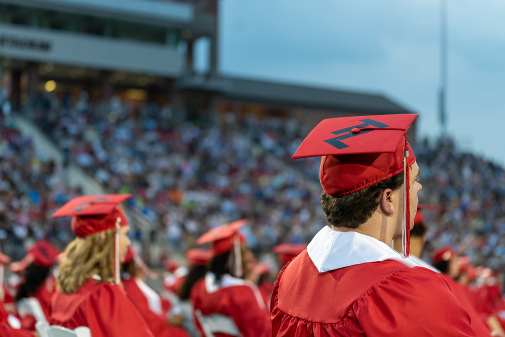 Tyler Legacy grads in cap and gown at 22 graduation