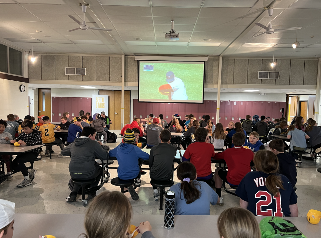 Students watching baseball
