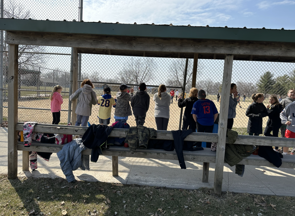 Students playing kickball