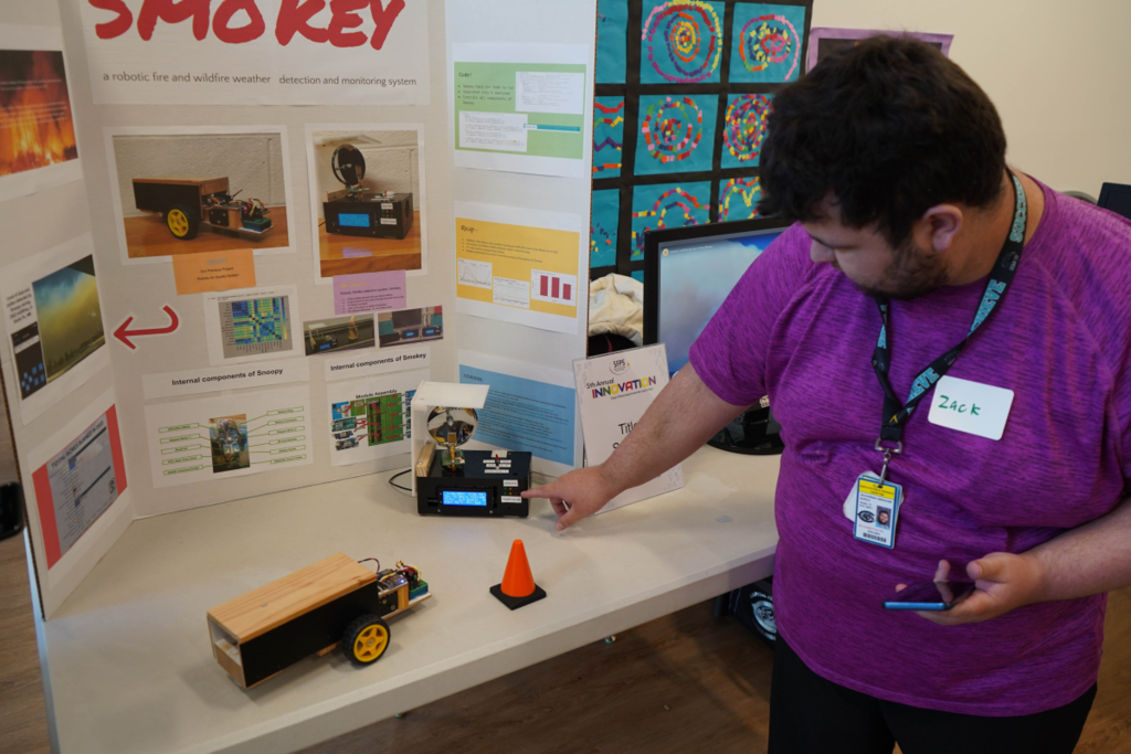 Student showing an air filter