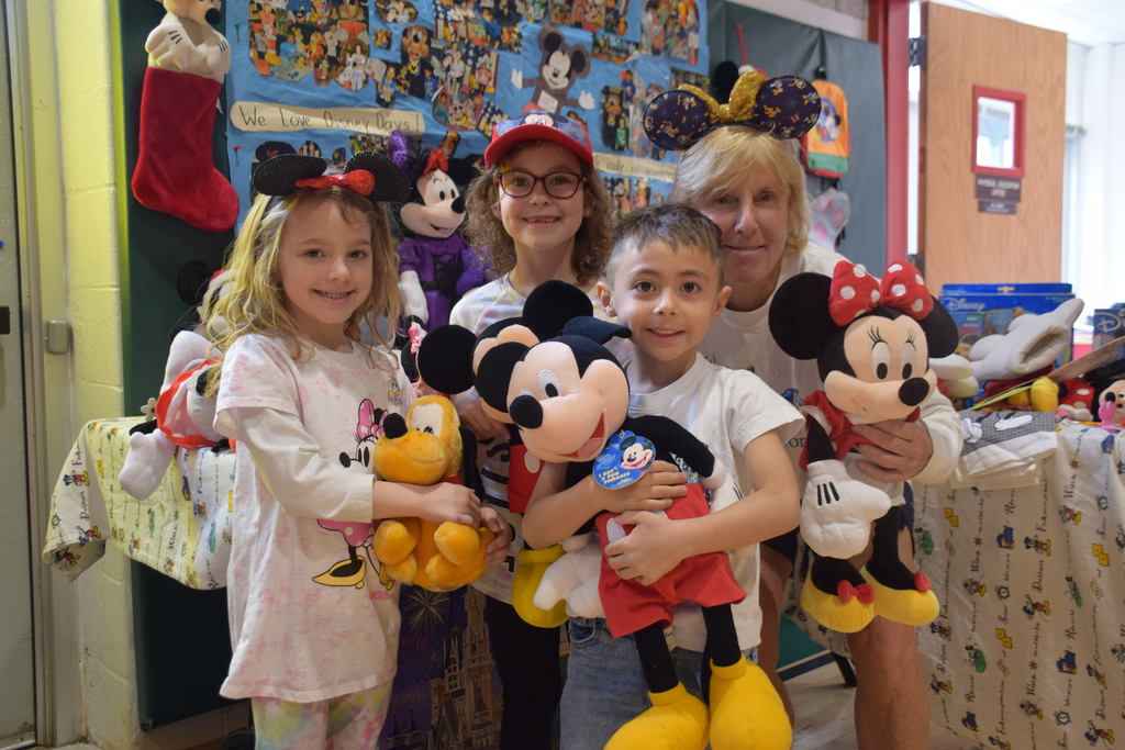 AMP students celebrate Disney Days with physical education teacher Maribeth Miller.