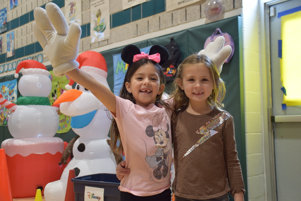 AMP students celebrate Disney Days with physical education teacher Maribeth Miller.