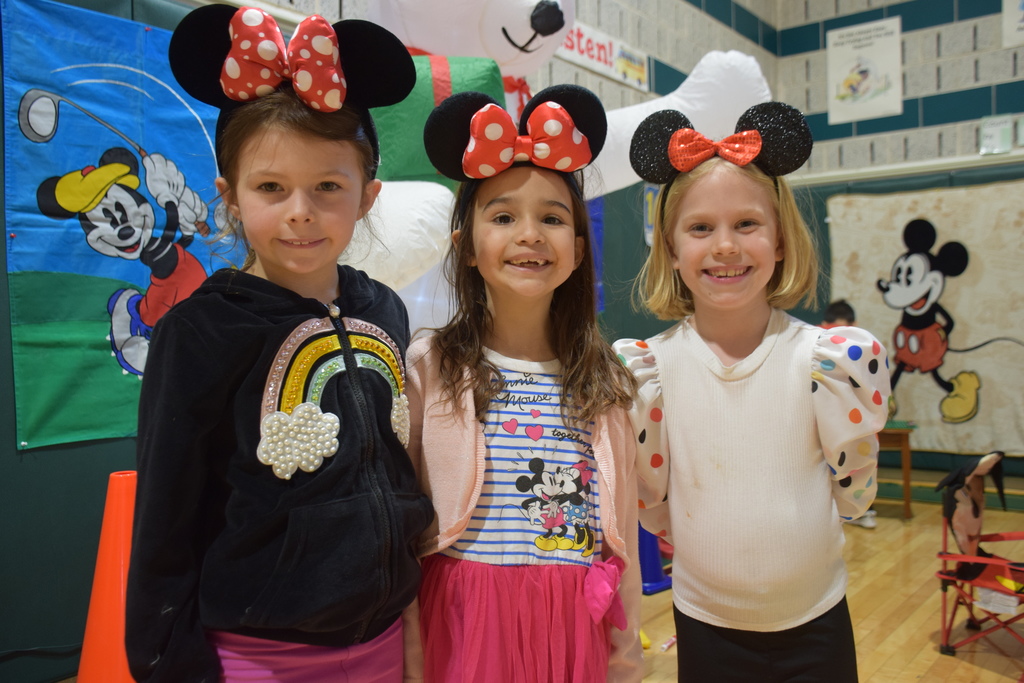 AMP students celebrate Disney Days with physical education teacher Maribeth Miller.