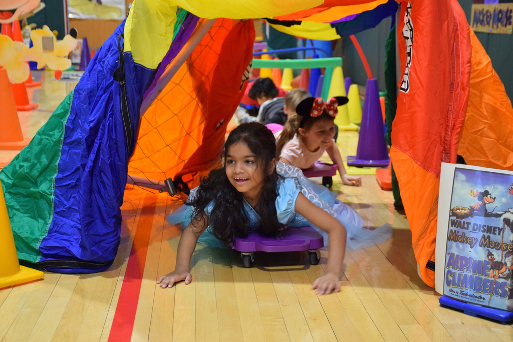 AMP students celebrate Disney Days with physical education teacher Maribeth Miller.