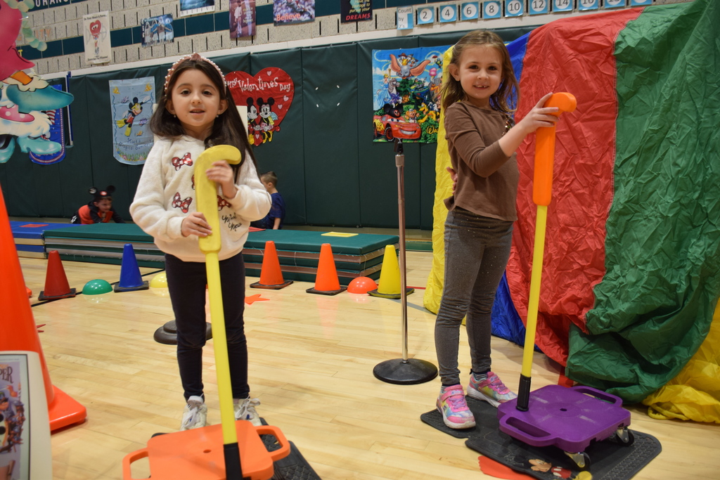 AMP students celebrate Disney Days with physical education teacher Maribeth Miller.