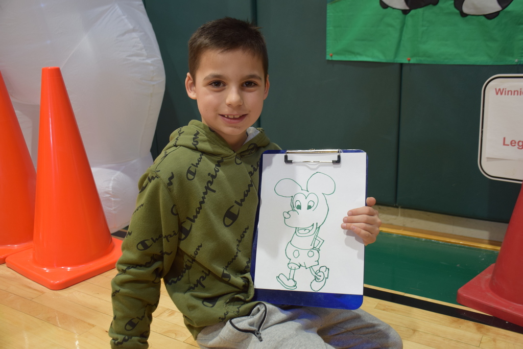 AMP students celebrate Disney Days with physical education teacher Maribeth Miller.