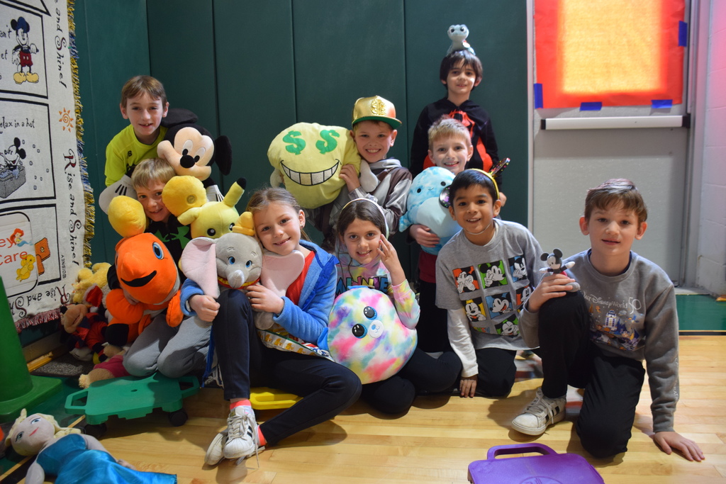 AMP students celebrate Disney Days with physical education teacher Maribeth Miller.