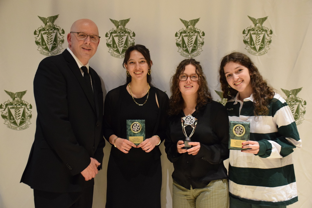 Locust Valley Film/Broadcast teacher Roger Boucher (left) with award winners Gianna Cassase, Abigail Maselli and Amelia Bonterre for their music video “VENUS!”