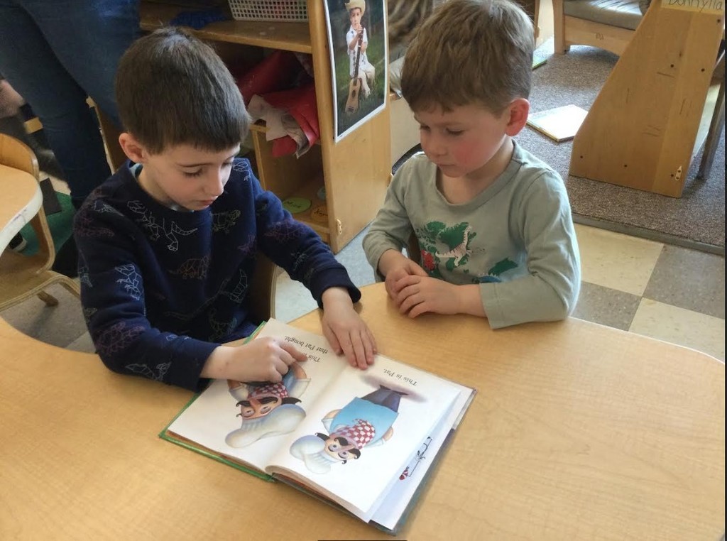 children reading together