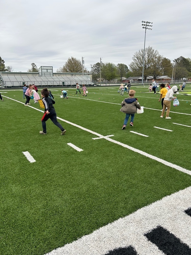 children hunting eggs