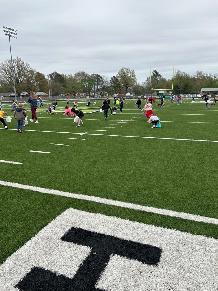 children hunting eggs