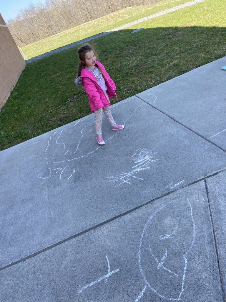 student with chalk