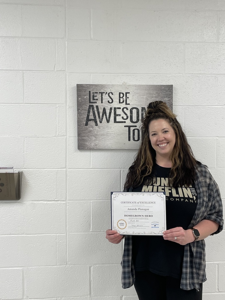 Mrs. Flanagan with award