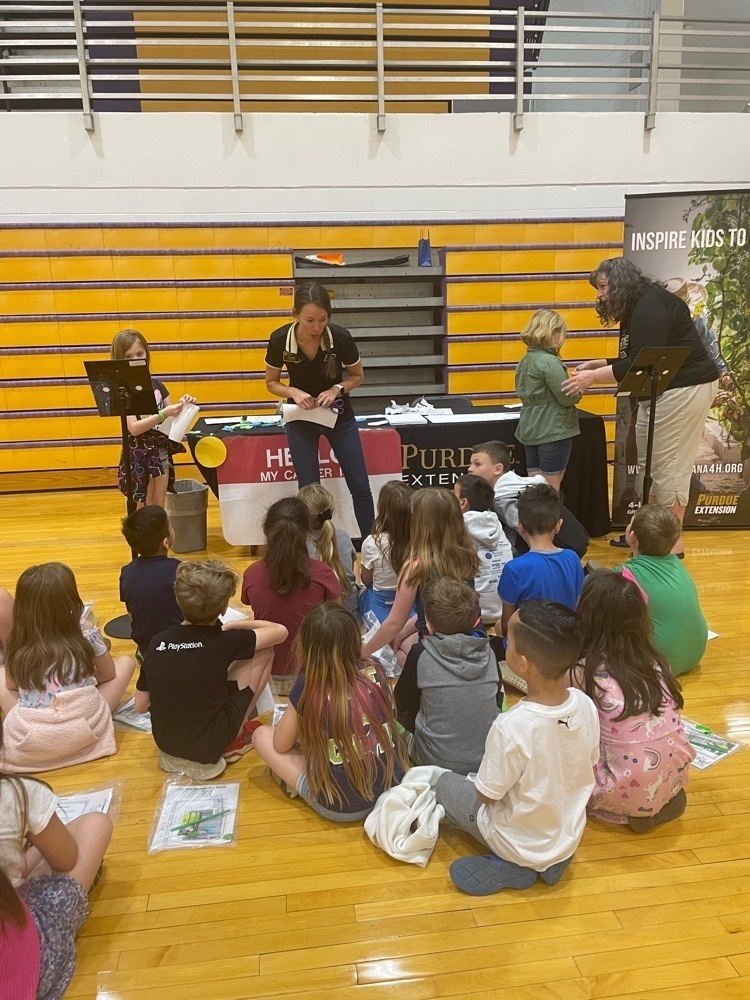 students listening to a presenter share about a career