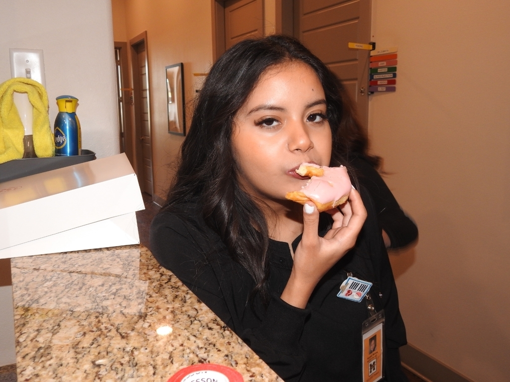 Karime eating a donut