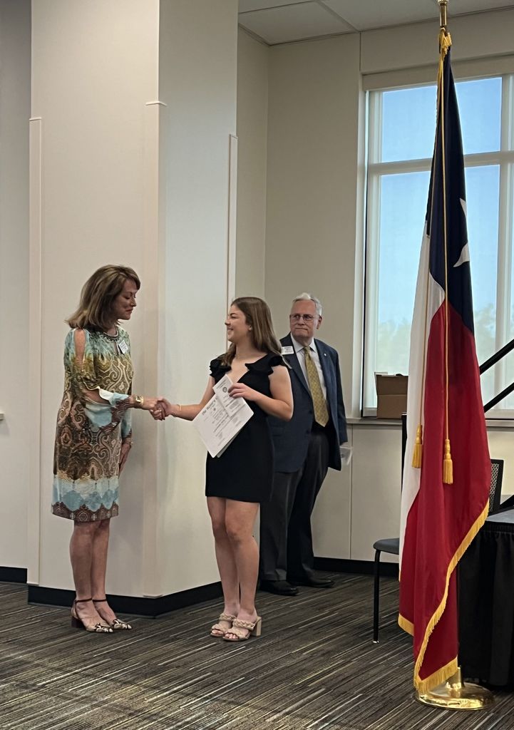 Legacy student Hannah Smith getting her Rotary Young Citizens Club certificate