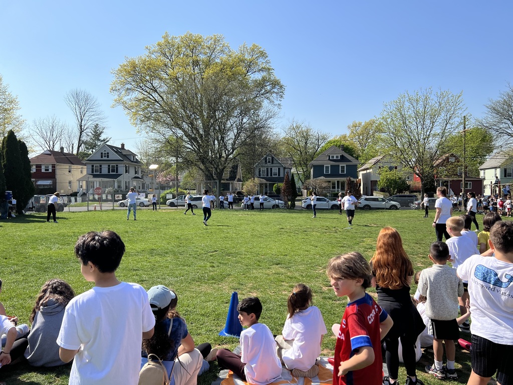 Students watching the kickball game