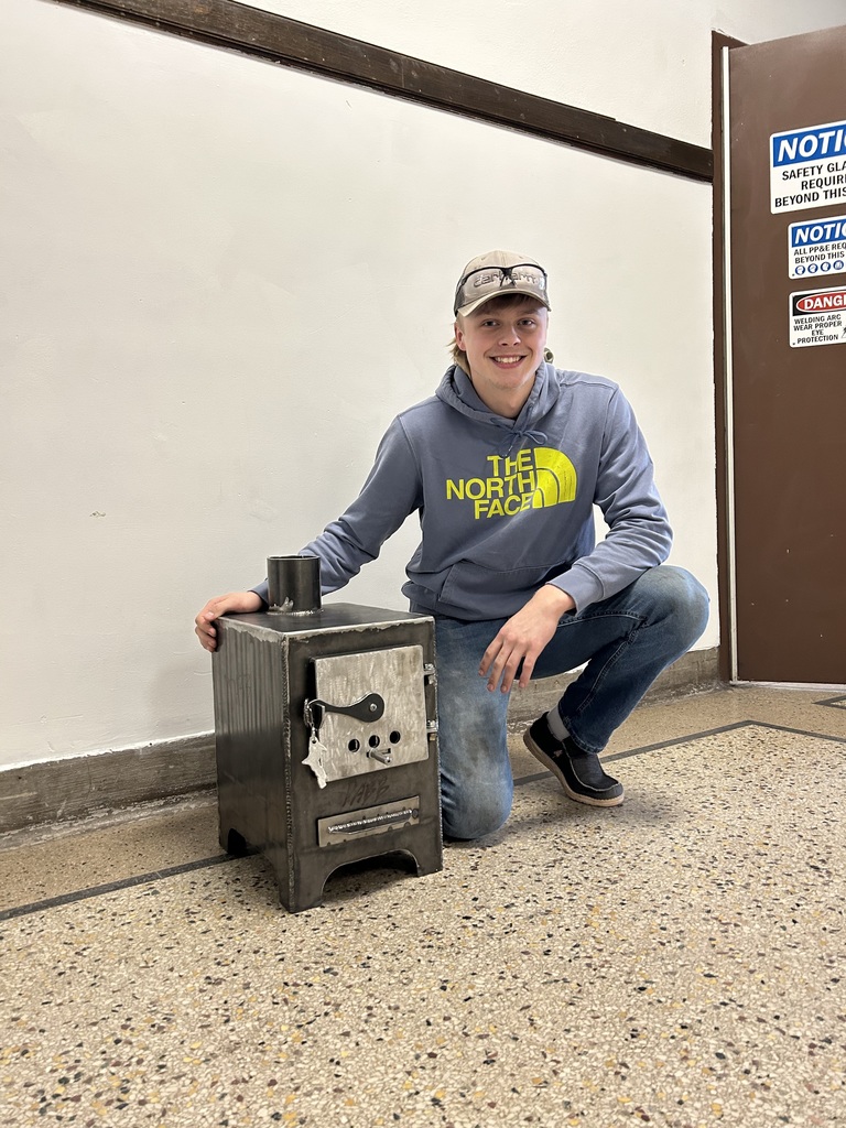 Cody Dabb shows off his wood stove.