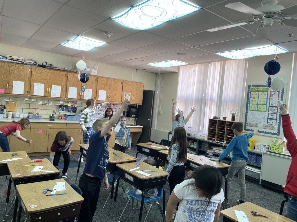 2nd grade is learning about seed dispersal