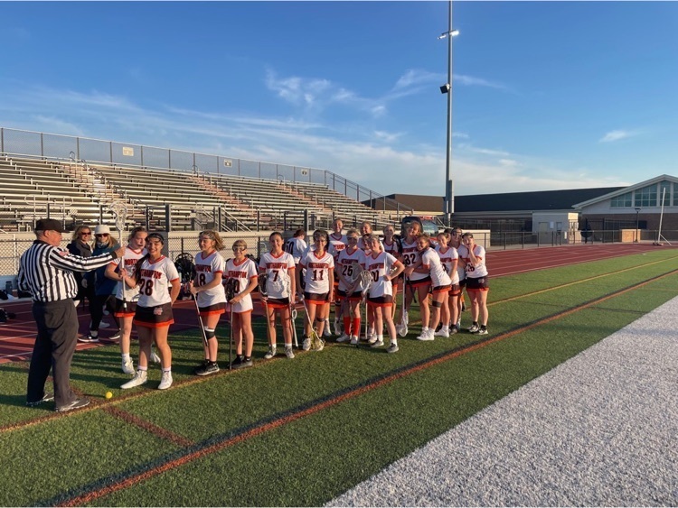 NAHS girls lacrosse team prepares for their game 