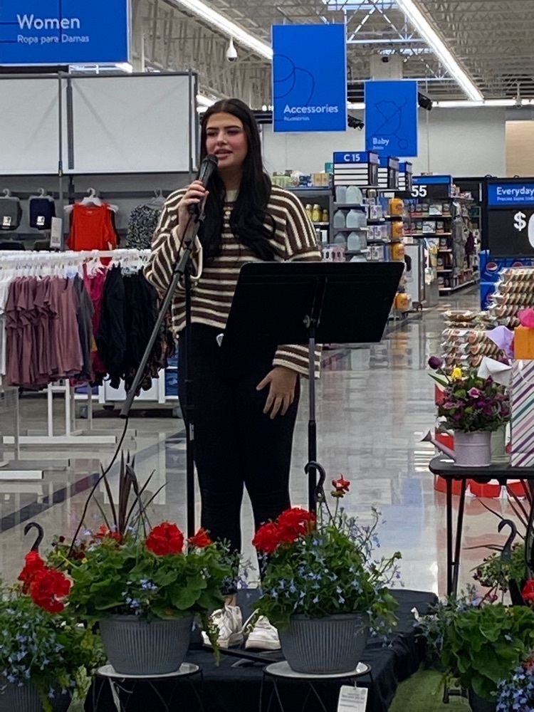 Delaney Collins Performing the National Anthem at Walmart, Lexington.