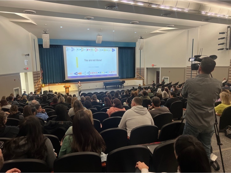 teachers in auditorium