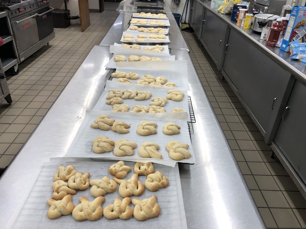 Baking II Class is currently doing "Baking Around the World." Marge Strum was Baking II's guest speaker / chef making Kringla (a Norwegian cookie). Here are some pictures from day two of rolling out and baking the cookies. Some students got really good at this and rolled out "one-handed". 