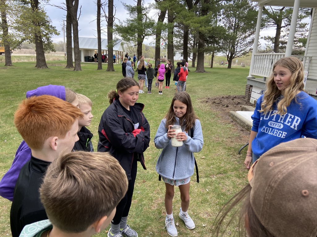 We are at the Norman Borlaug Heritage farm with 5th grade. These students are making butter!