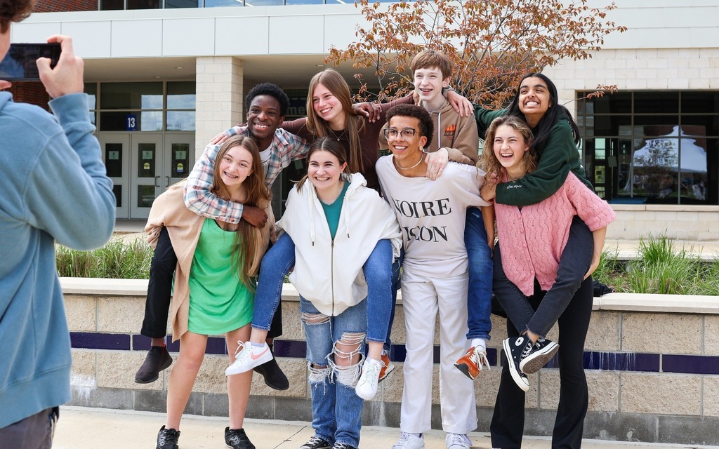 Students pose for a photo together