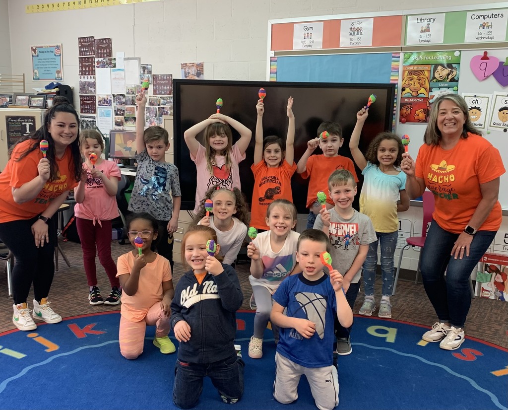 group picture of primary class with maracas