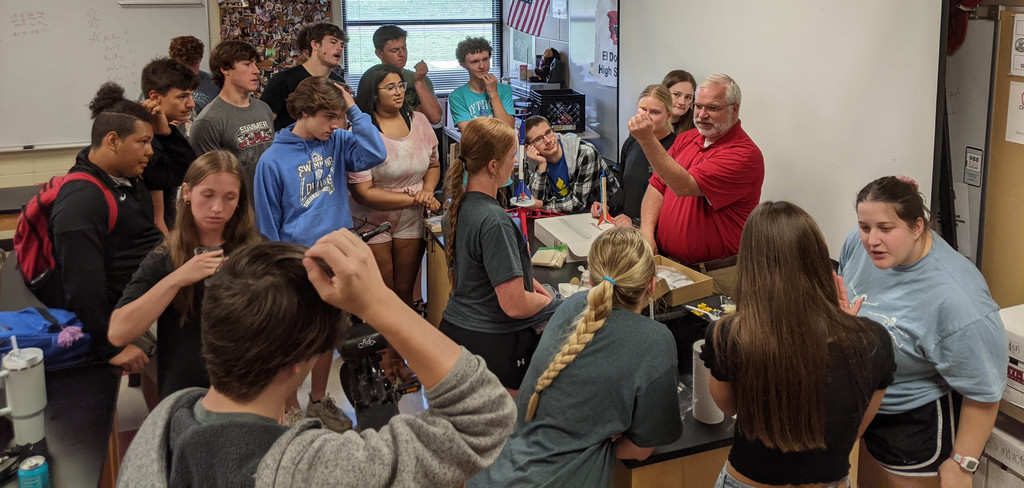 Students learning about the igniters before launch