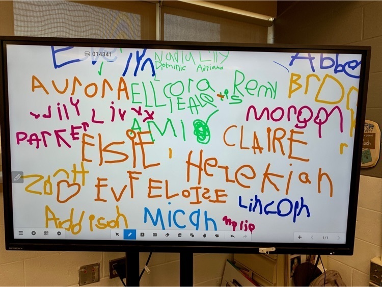 picture of students names written on board at kindergarten round up 