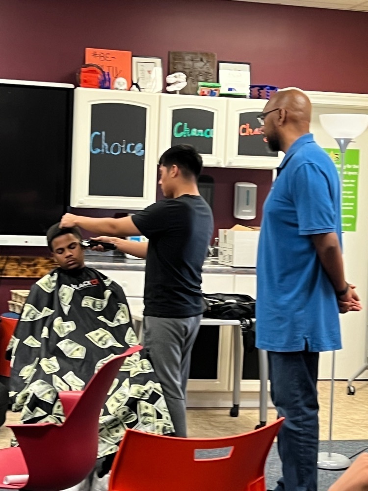 Cassius watching BNBC cutting hair