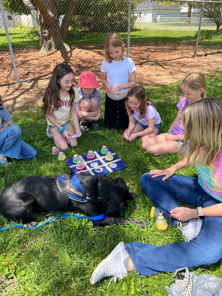 Knox plays tic tac toe at recess