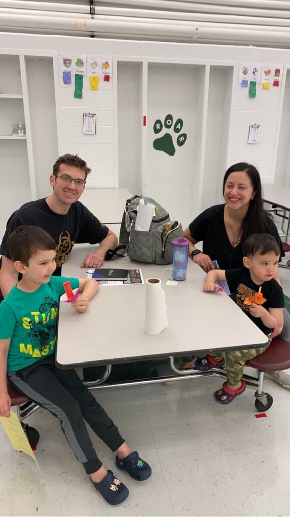 A family of four has a treat in the cafeteria