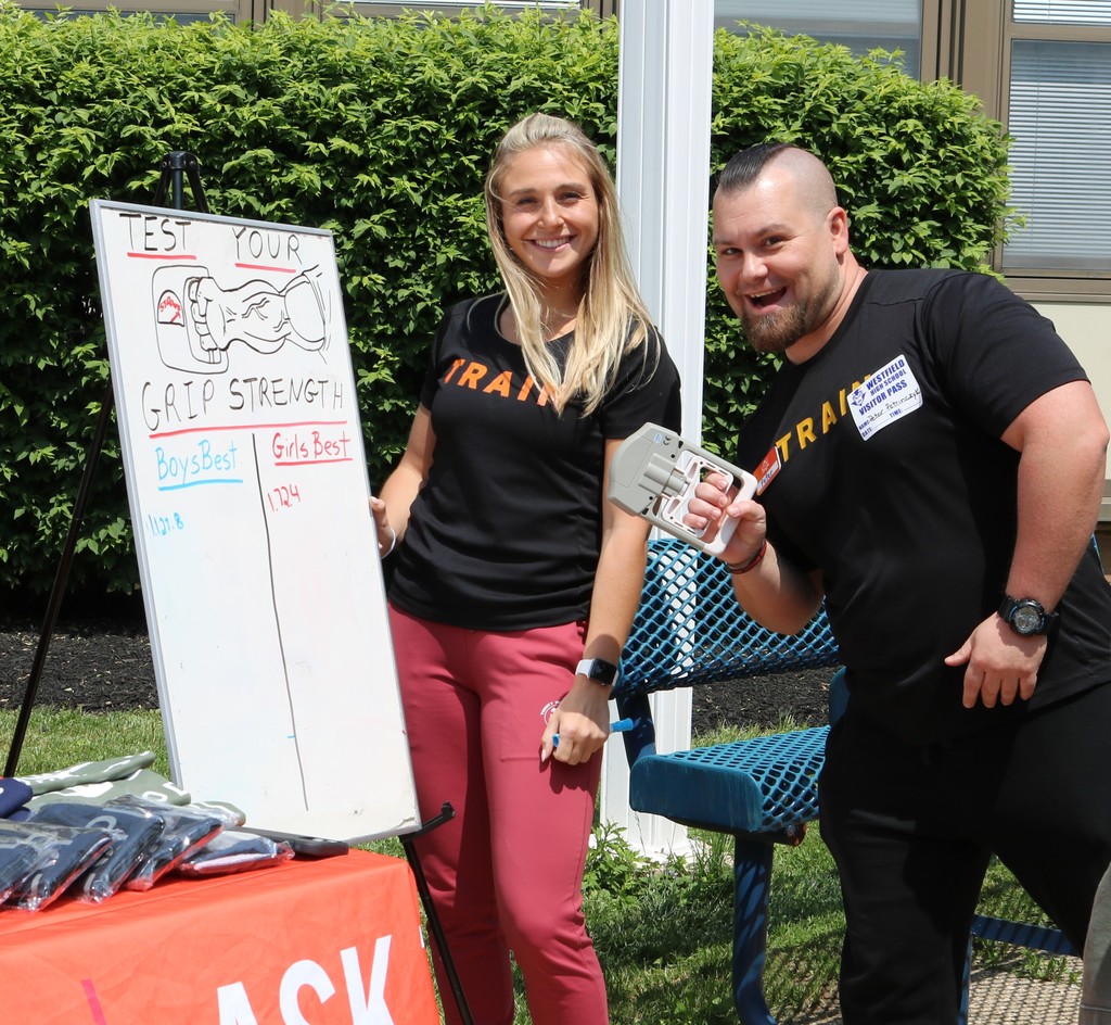 personal trainers pose for picture at Mental Health Fair