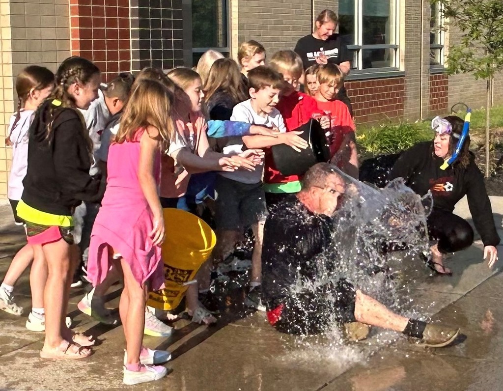 Craig Campbell gets water poured on his head