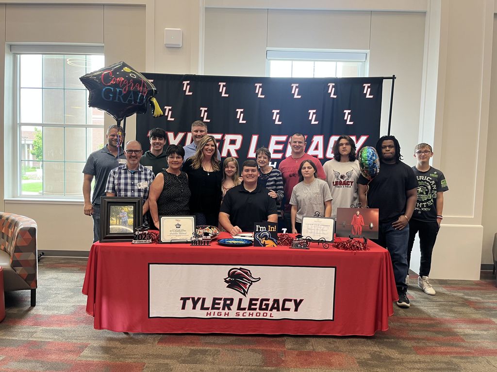 Brenden Mitchell and his family and friends at his signing