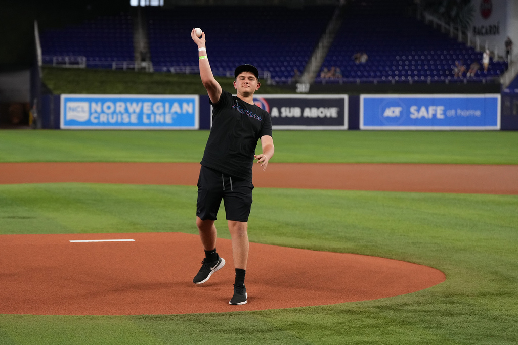 One student was chosen to throw the first pitch