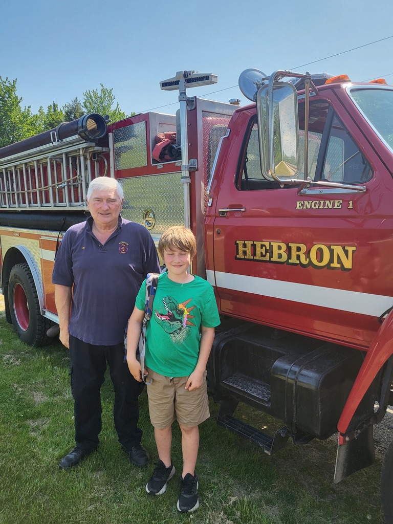 Posing in front of the fire truck