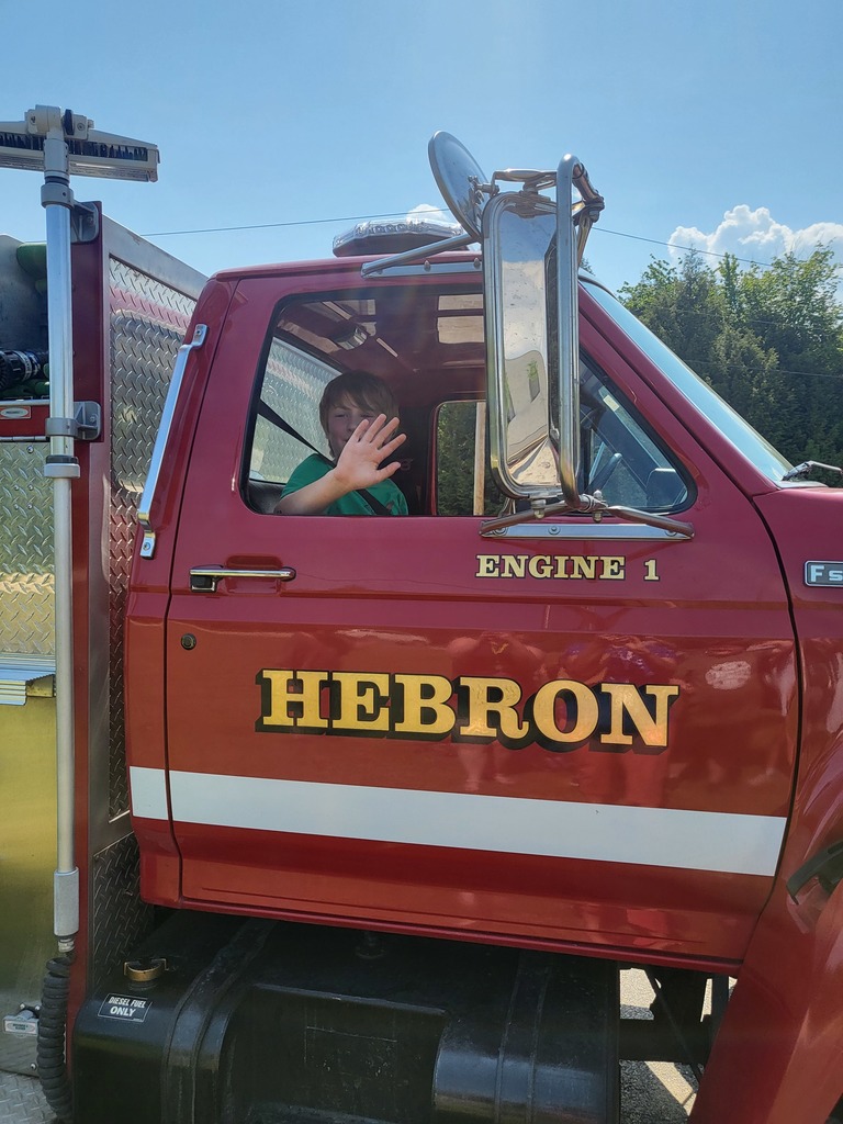 waving from the truck