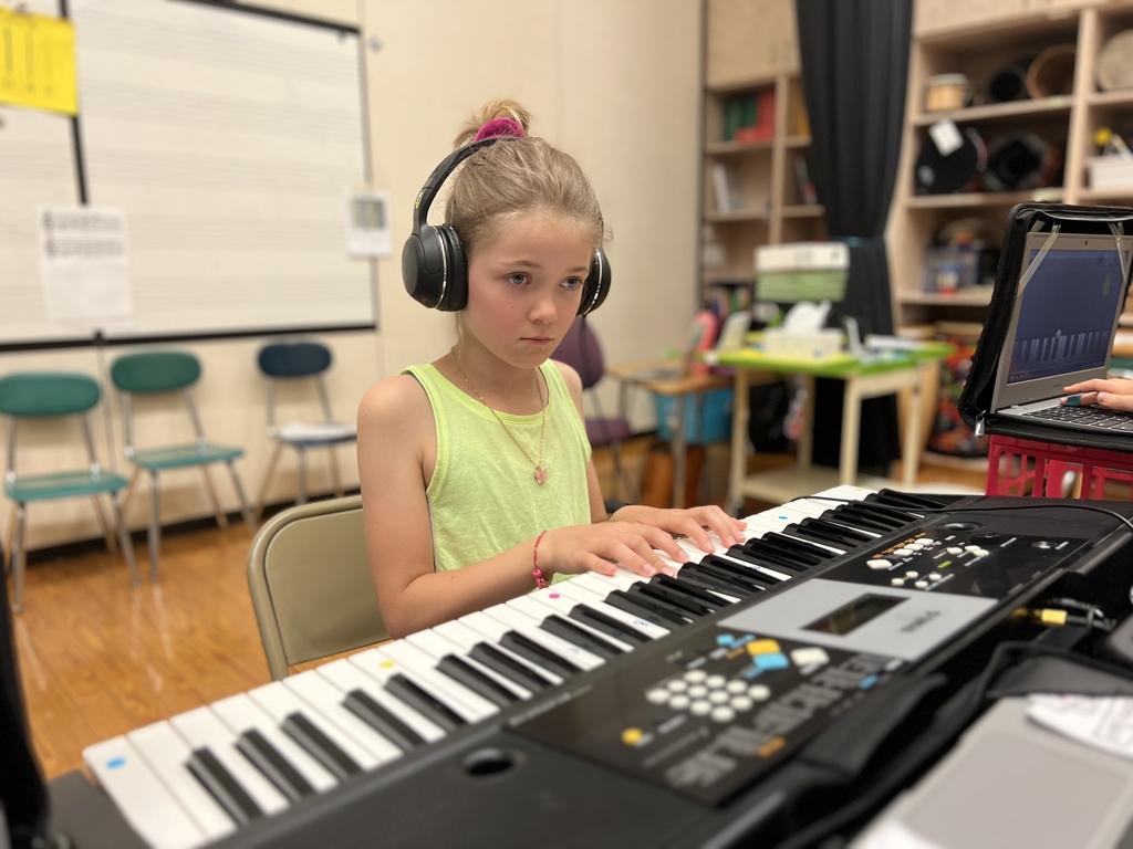 3rd grader playing piano